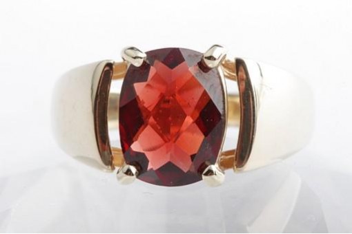 Ring mit Granat 375 9K Gelbgold Gr. 50